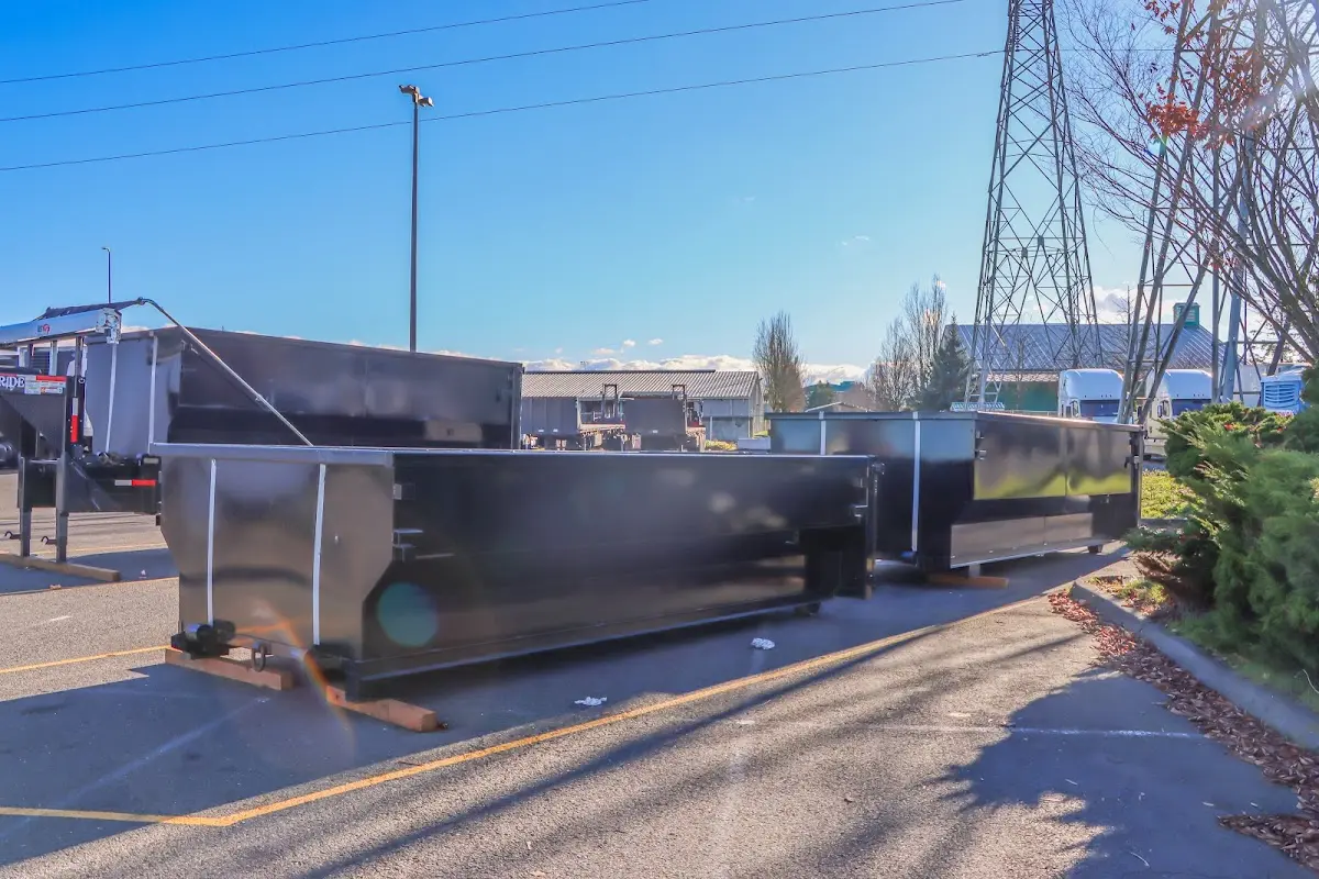 Roll-off dumpster ready for waste disposal at job site for 30 Yard Dumpster Rental in Basehor